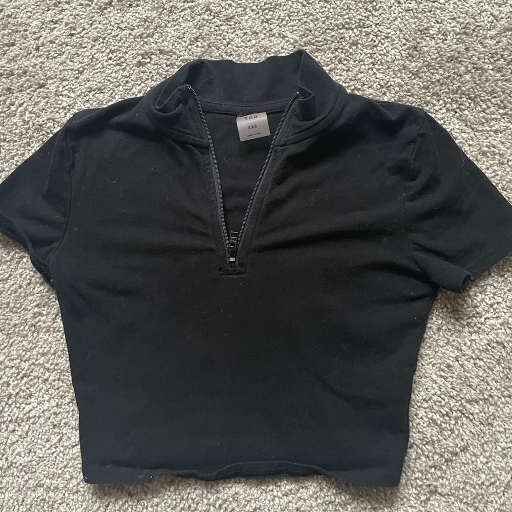TNA half zip crop top